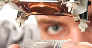 Technician Examining Computer Processor